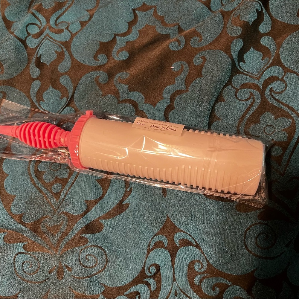 Pink and White Balloon Pump